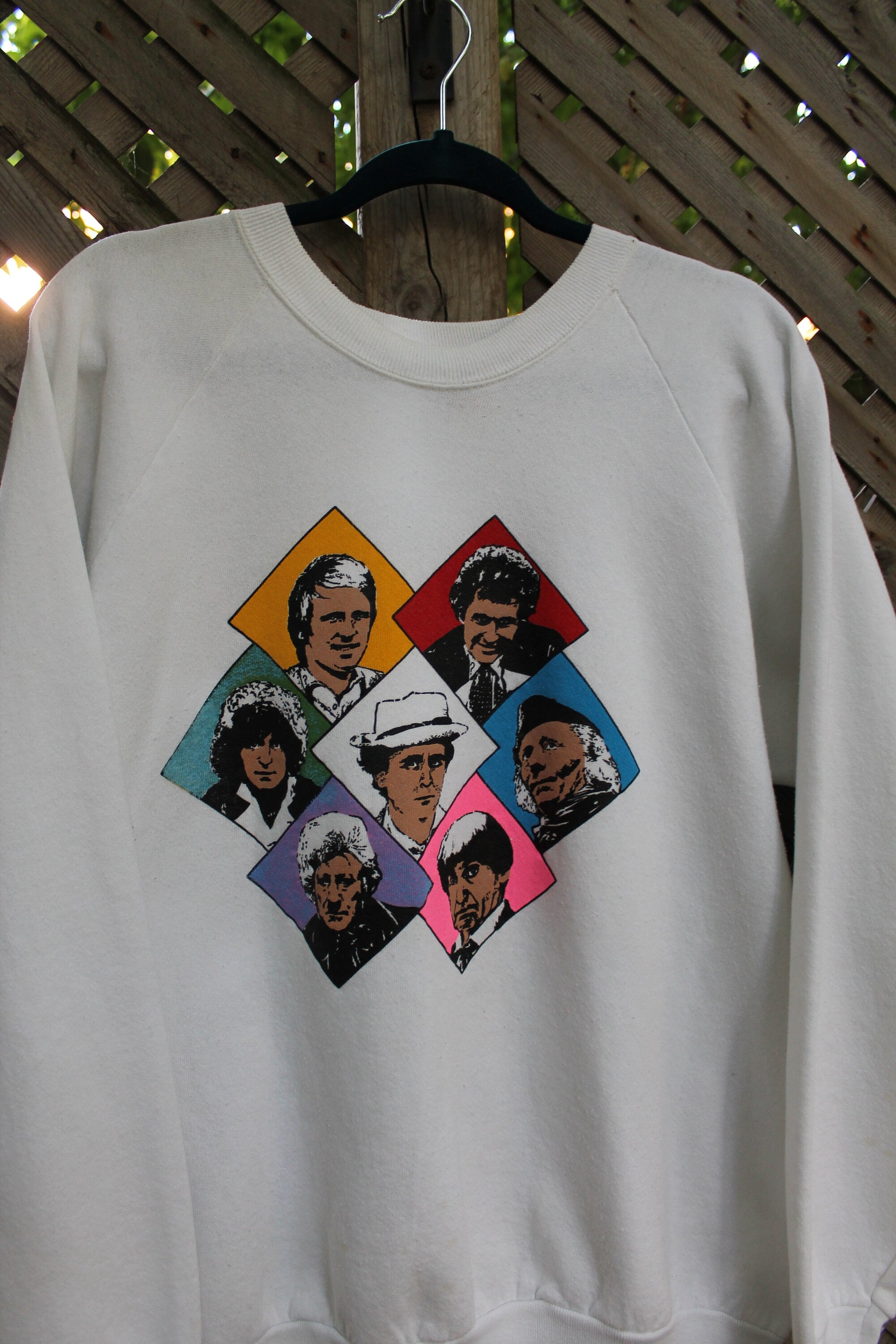 Vintage 1980s Pop Culture Theme Raglan Crewneck
