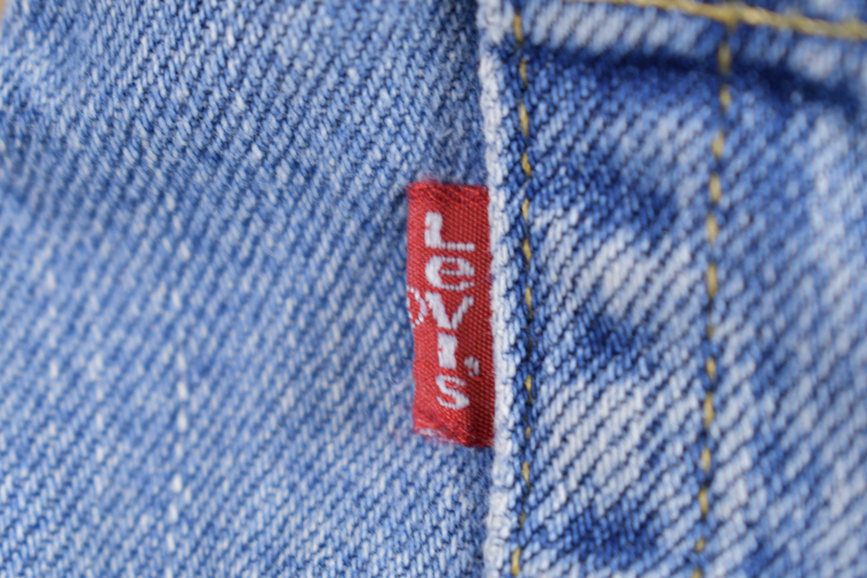 Vintage 1990s Levi's 550 Red Tab Jeans Size 33 x 28.5