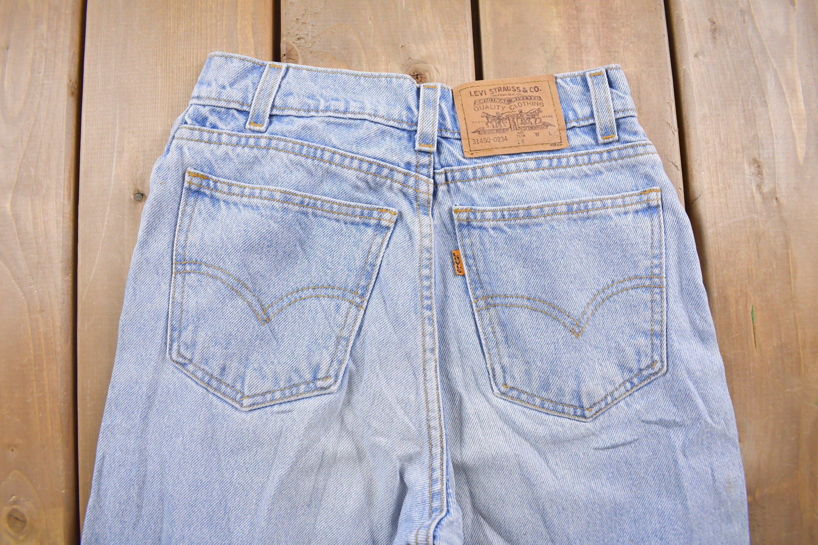 Vintage 1990s Levi's Orange Tab Jeans Size 22 x 26