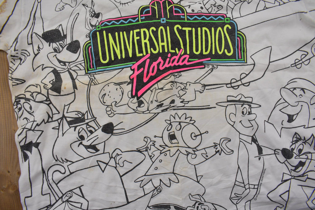 Vintage 1990s Universal Studios All Over Print Graphic T-Shirt