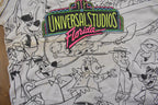 Vintage 1990s Universal Studios All Over Print Graphic T-Shirt
