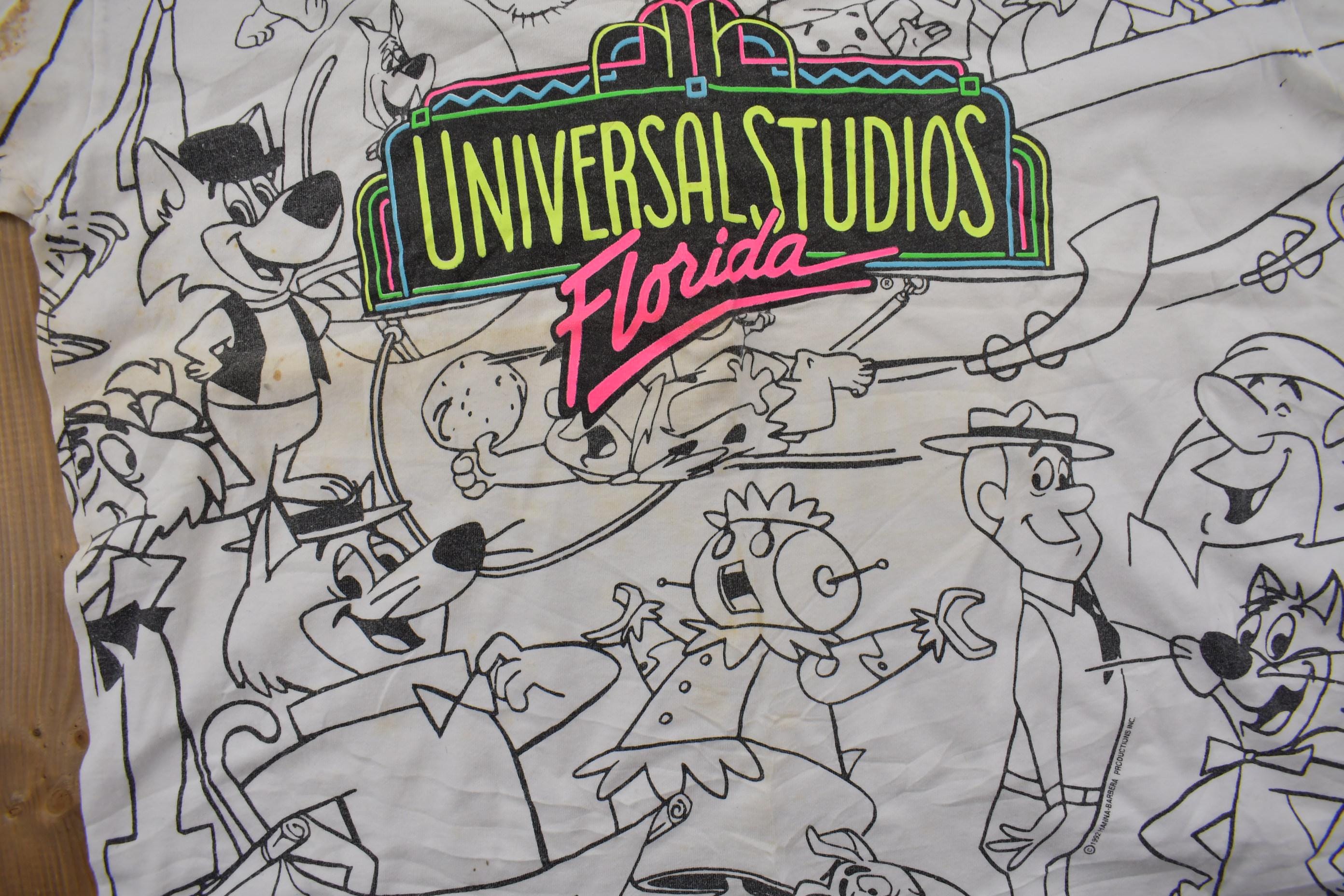 Vintage 1990s Universal Studios All Over Print Graphic T-Shirt