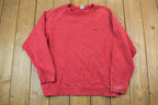 Vintage 1990s Red Nike Embroidered Mini Swoosh Crewneck Sweatshirt