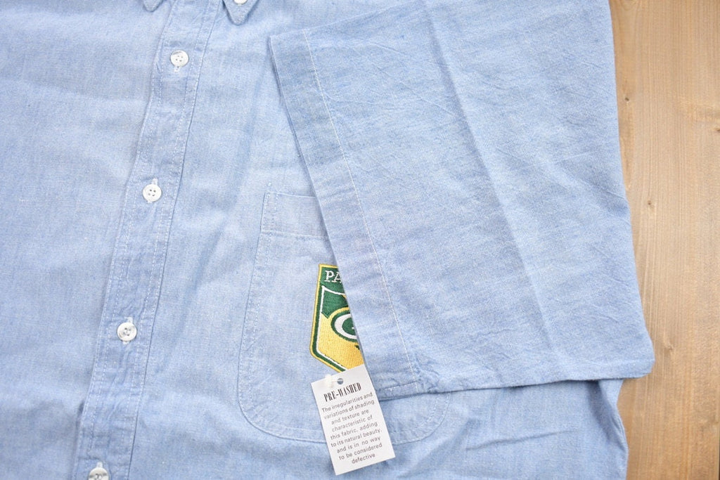 Vintage 1990s Embroidered Green Bay Packers NFL Denim Button Up T-Shirt