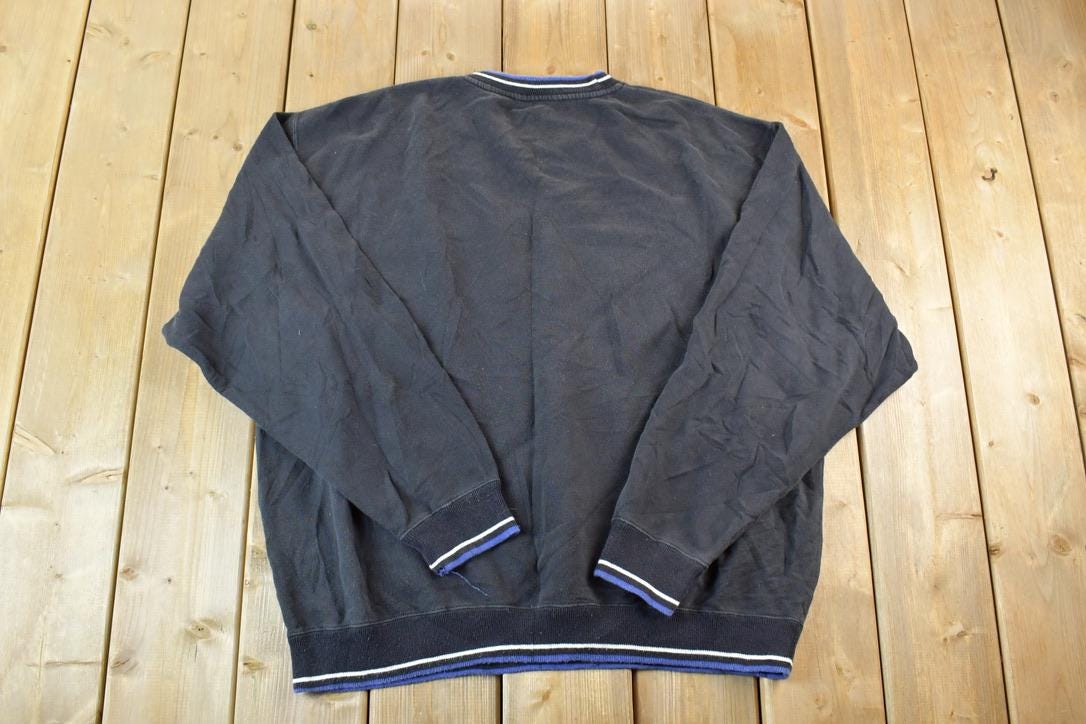 Vintage 1990s Greg Norman Shark logo Souvenir Crewneck Sweatshirt