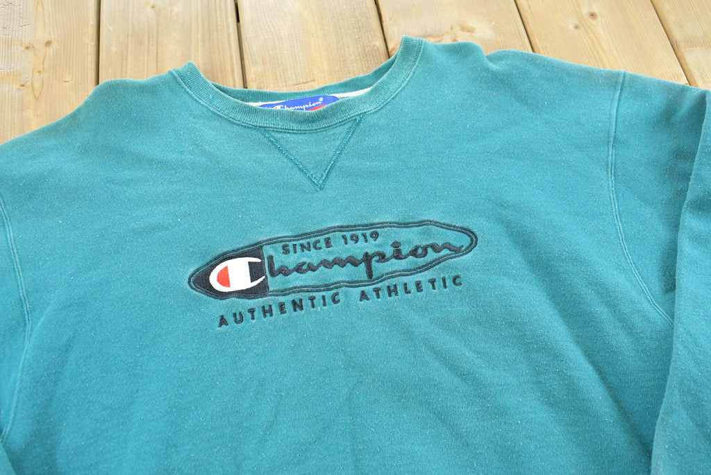 Vintage 1990s Champion Spellout Crewneck Sweatshirt Men's L / 90s Streetwear / Blank Sweater / Athleisure / Embroidered