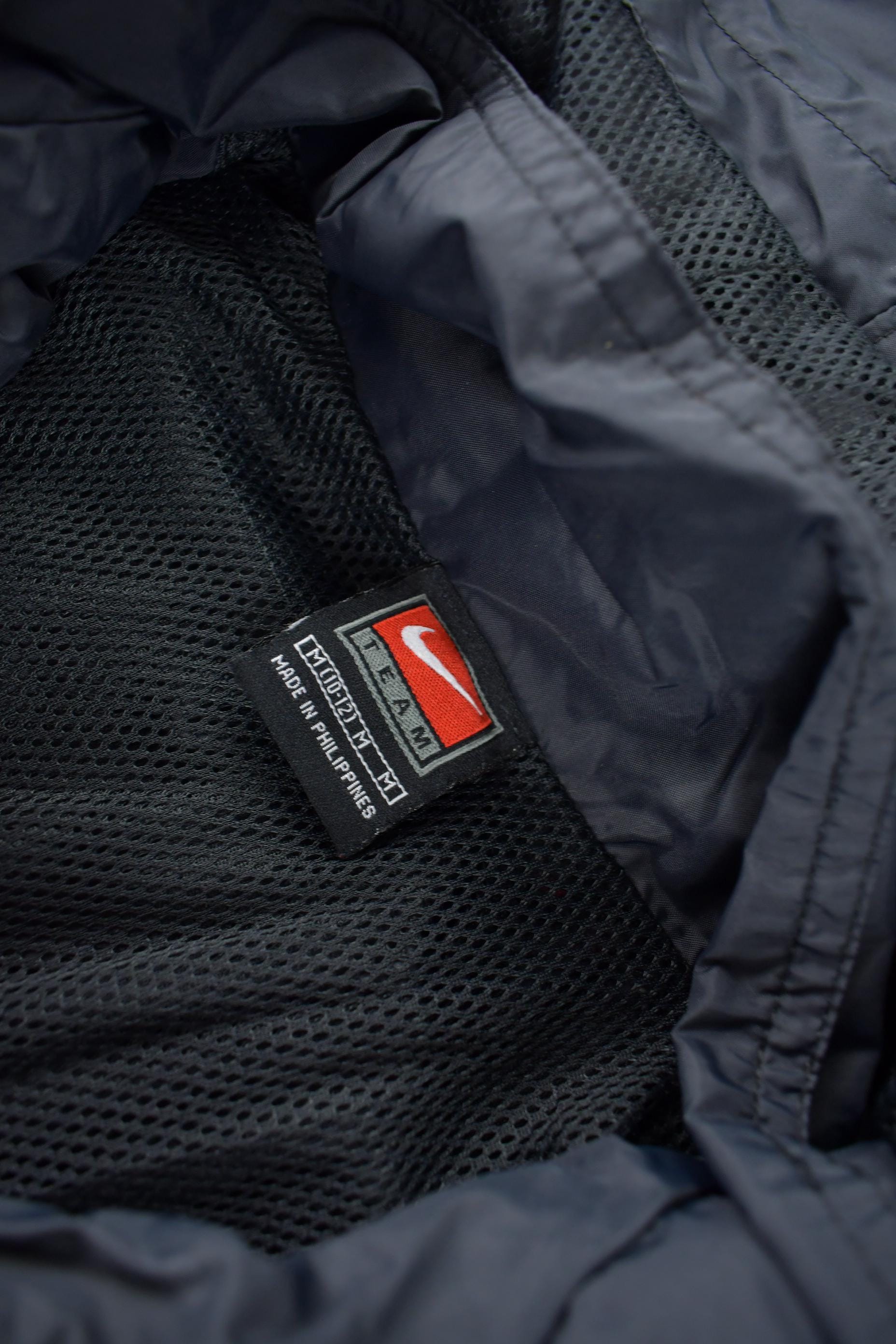 Vintage 1990s Black Nike Mini Swoosh Women's Windbreaker Jacket Size M