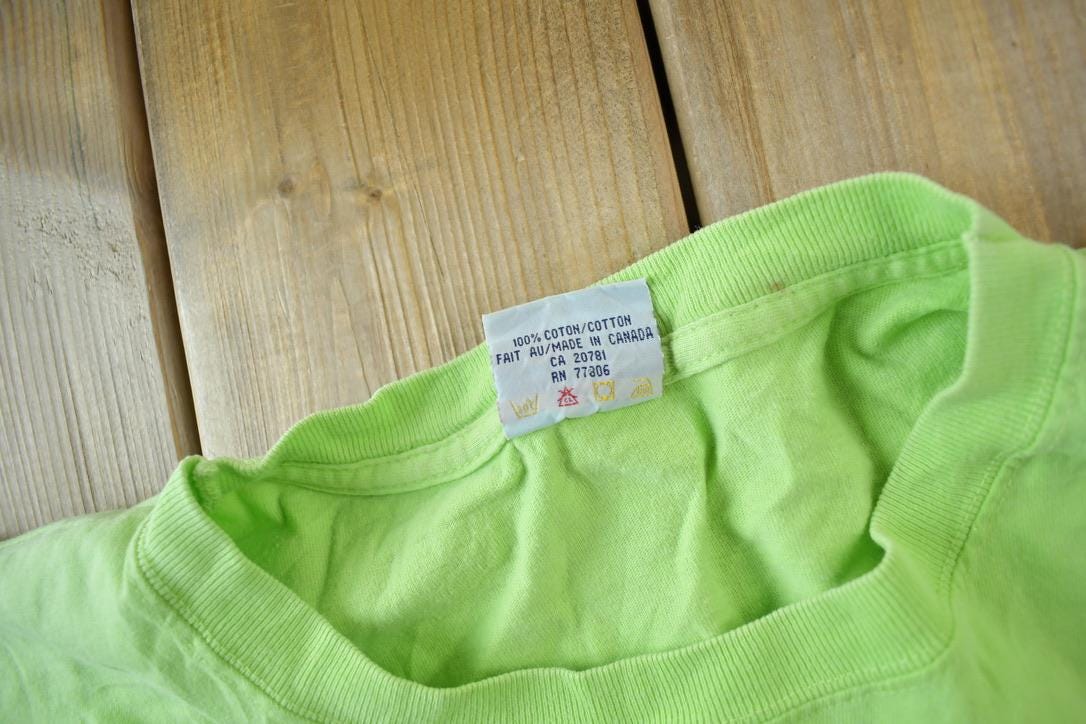 Vintage 1990s Tommy Hilfiger Total dive System Graphic T Shirt