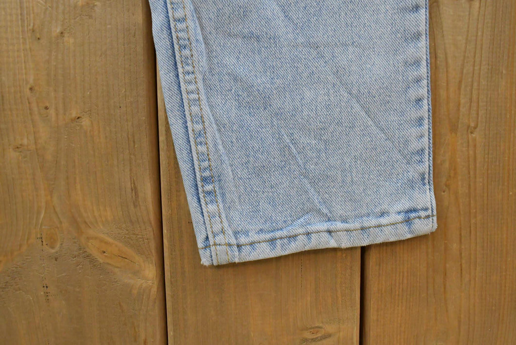 Vintage 1990s Levi's 550 Relaxed Tapered Denim Jeans Women's 28 x 31 / 90s Levi's / Distressed Sun Faded Jeans / Streetwear / Made in USA