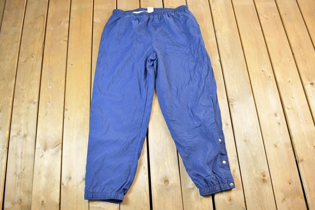 Vintage 1990s Nike Quarter Tearaway Mini Swoosh Splash Athletic Pants Size XL