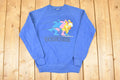 Vintage 1980s Jerzees Boundary Waters Speed Skating Cartoon Graphic Print Crewneck Sweatshirt Men's S