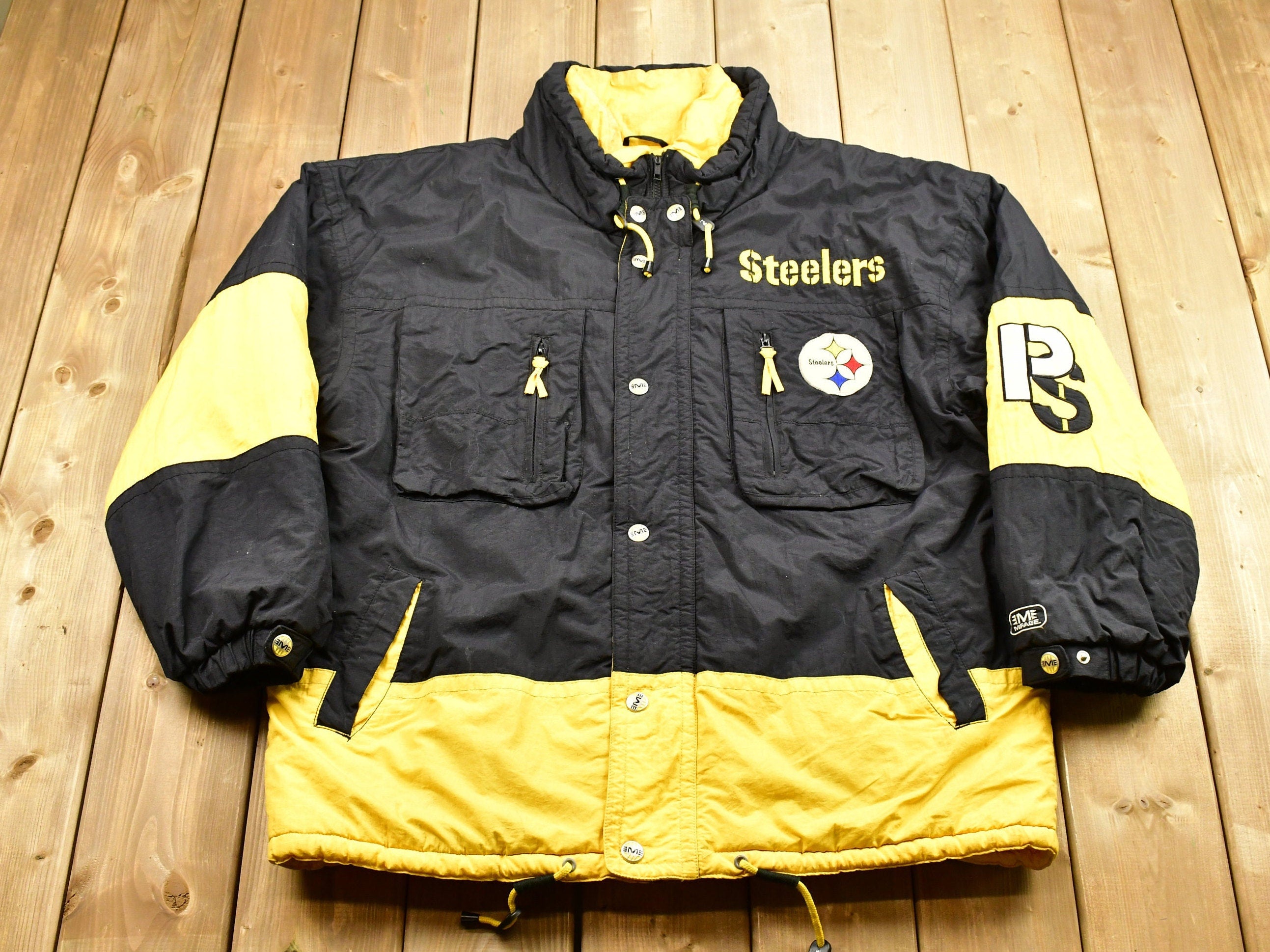 Vintage 1990s Pittsburgh Steelers NFL Mirage Full Zip Puffer Jacket