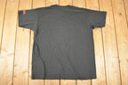 Vintage 1990s Screen Stars Best OSSEO Souvenir Aztec T-Shirt Men's L