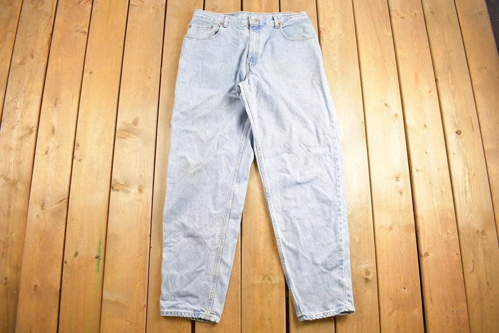 Vintage 1990s Levi 560 Red Tab Jeans Size 35 x 28