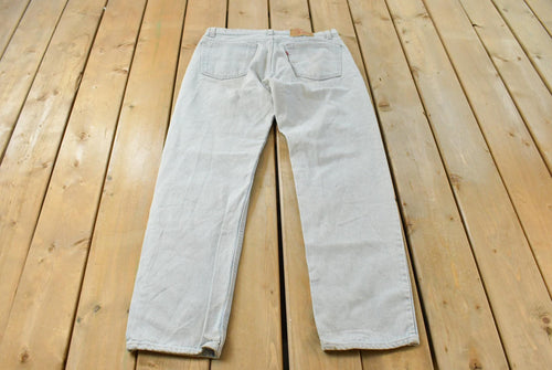 Vintage 1990s Levi's 505 Regular Fit Denim Jeans Men's 34 x 32 / 90s Levi's / Distressed Sun Faded Jeans / Made in USA