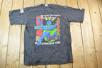 Vintage 1995 Starter Special Olympics World Games Souvenir Single Stitch Graphic Print T-Shirt
