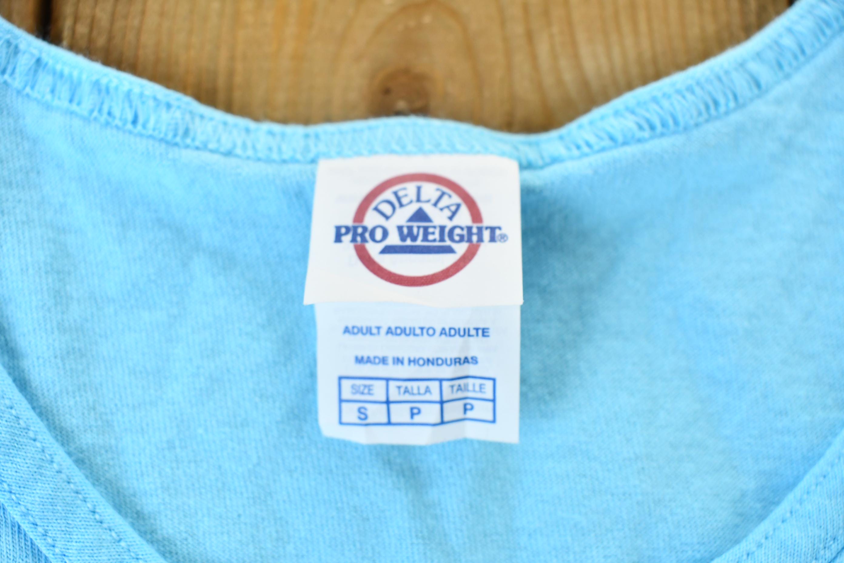 Vintage 1990s Baby Blue Quality Outdoor Wear Cayman Islands Souvenir Travel Graphic Tank Top