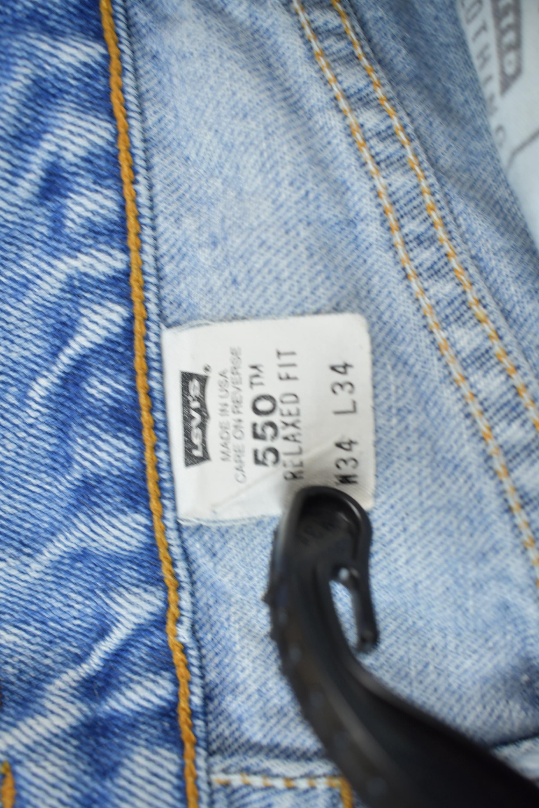 Vintage 1990s Levi's 550 Red Tab Jeans Size 34 x 34