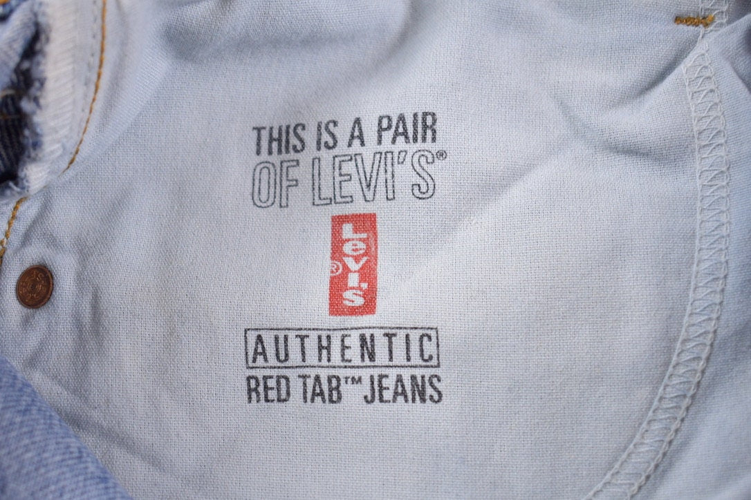 Vintage 1990s Levi 550 Red Tab Jeans Size 31 x 30