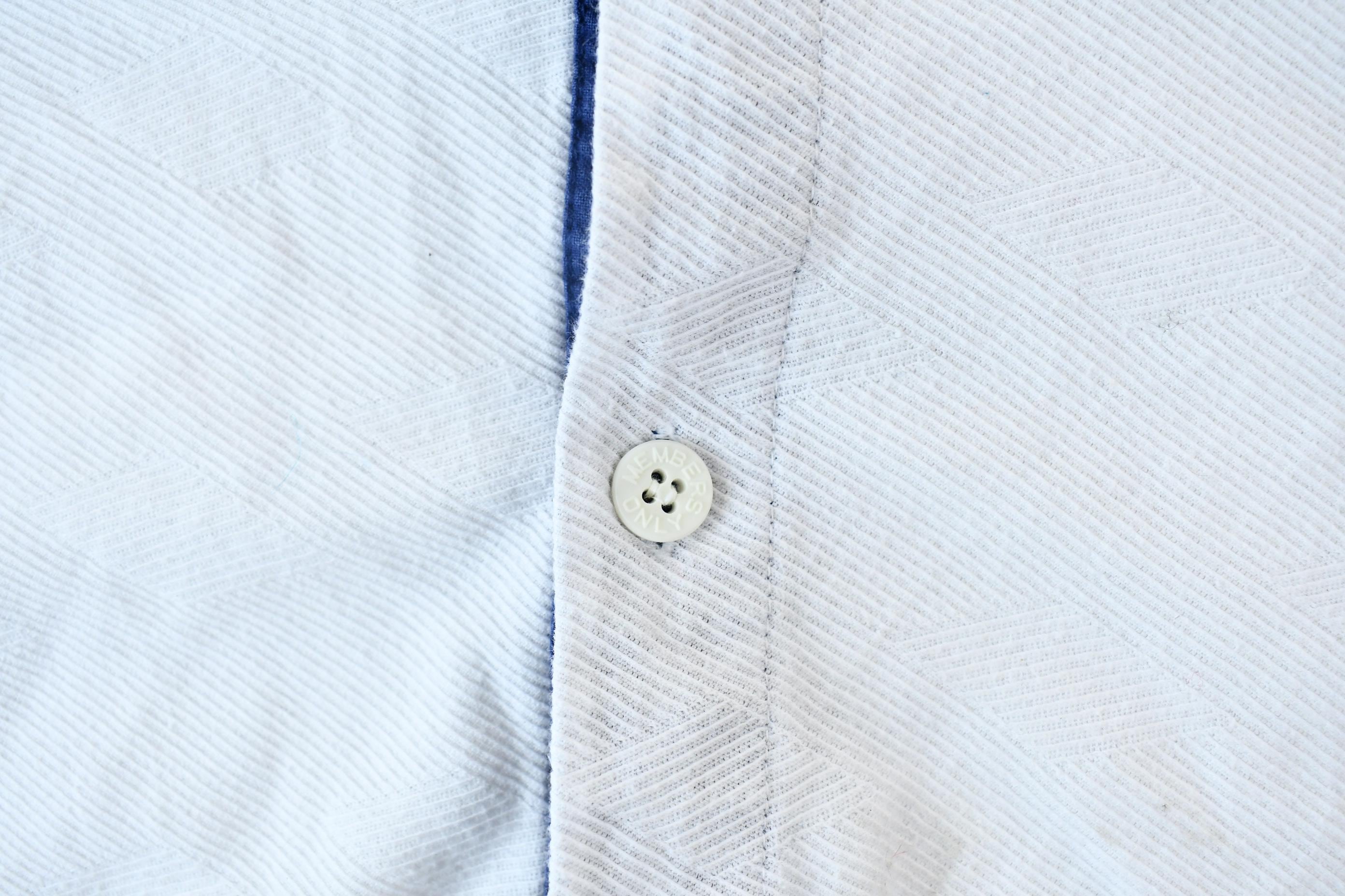 Vintage 1990s Members Only World Travel Club Textured Mandarin Collared Polo Shirt