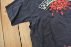 Vintage 1990s FEARLESS All Over Print Skull Graphic T-Shirt