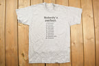 Vintage 1985 Nobody's Perfect Car Ranking Graphic T Shirt