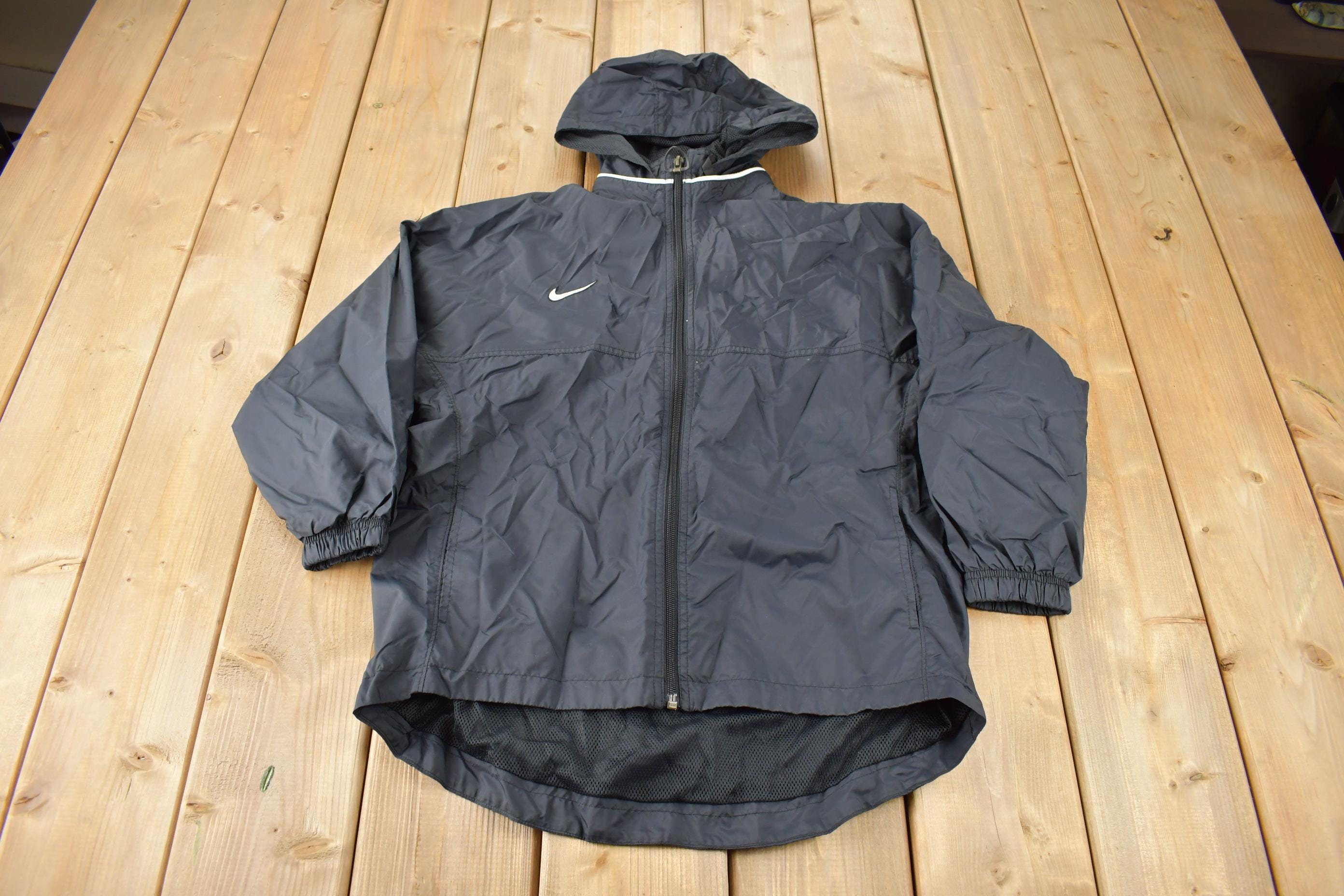 Vintage 1990s Black Nike Mini Swoosh Women's Windbreaker Jacket Size M