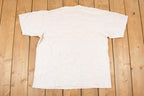 Vintage 1988 Bass Awkward Comedy Fishing Graphic Print Souvenir T-Shirt Men's L