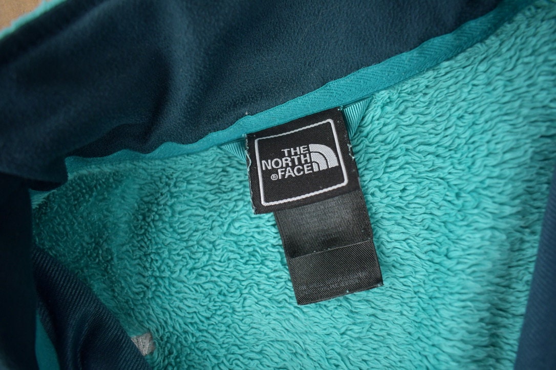 Vintage 1990s The North Face Women's Blue Fleece Sweater