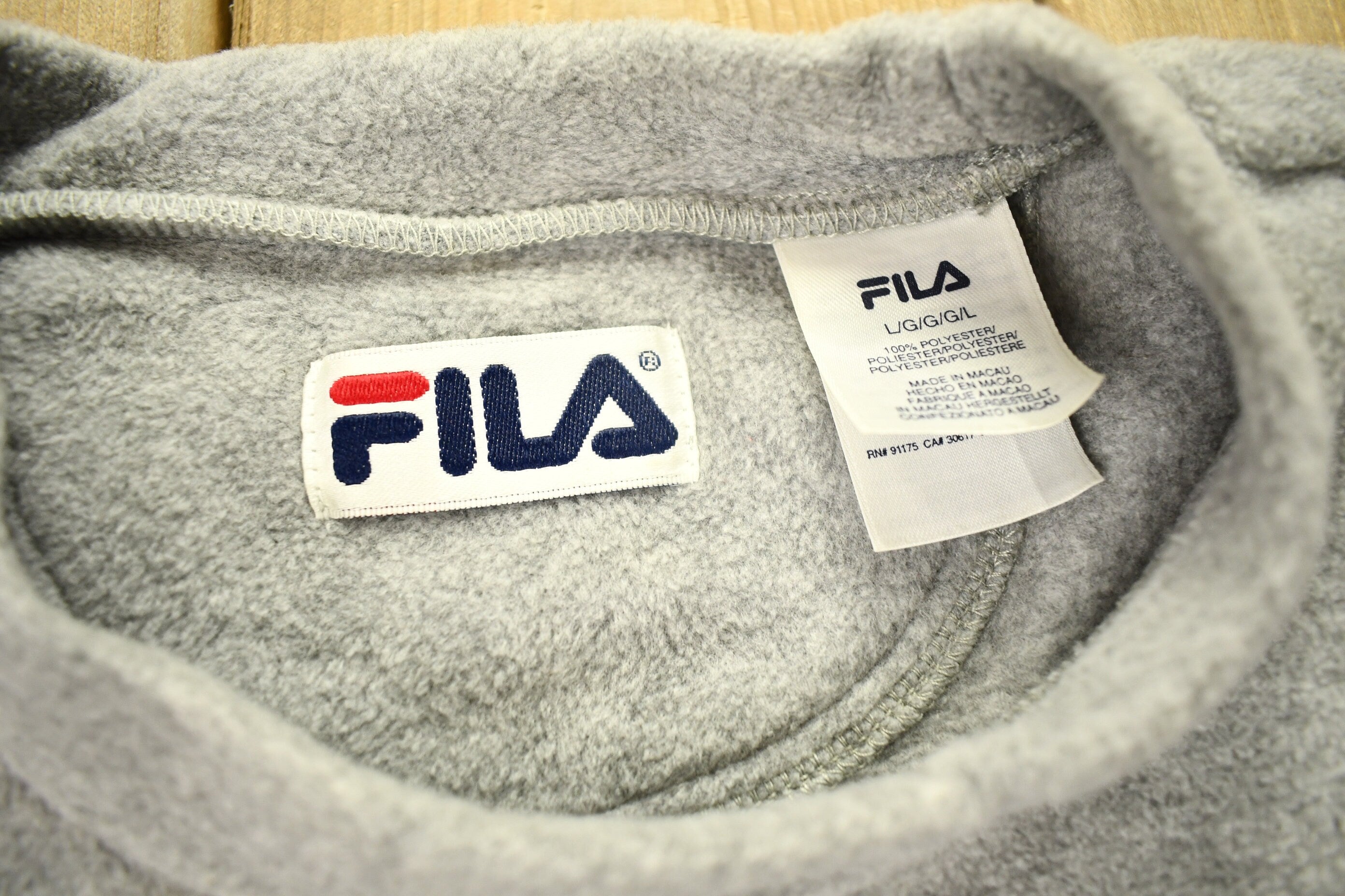 Vintage 1990s Fila Spell Out Fleece Crewneck Sweater