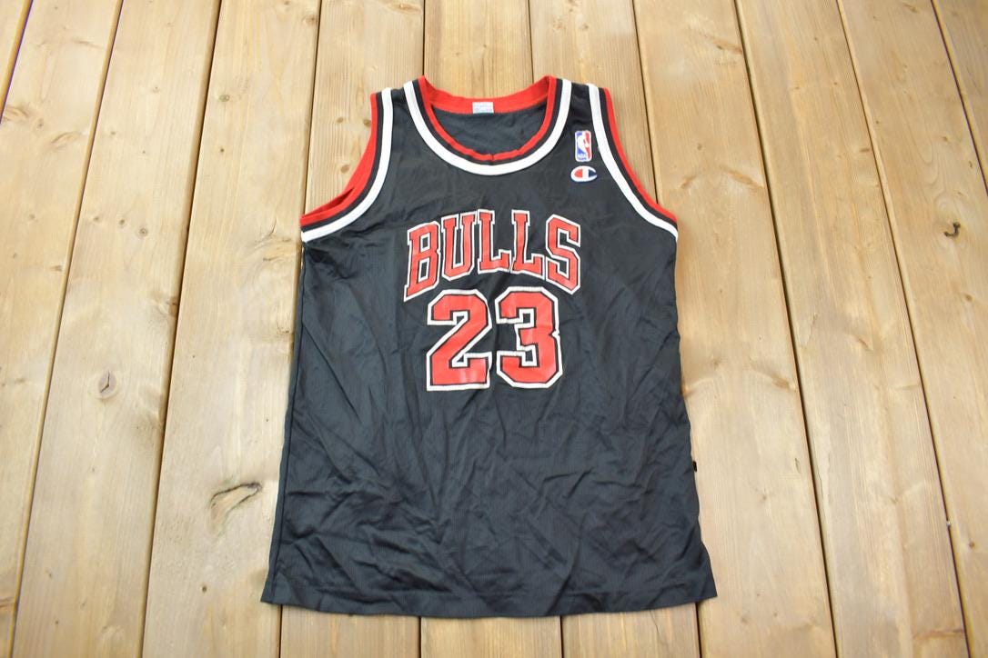 Vintage 1990s Michael Jordan Chicago Bulls NBA Champion Youth Sized Jersey