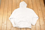 Vintage 1990s Jansport Cross Grain Johnnies Graphic Print Hoodie Sweatshirt Men's M
