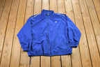 Vintage 1990s Starter Embroidered Windbreaker Jacket