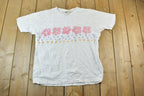Vintage 1990s Northern Reflections Wrap Around Print T-Shirt