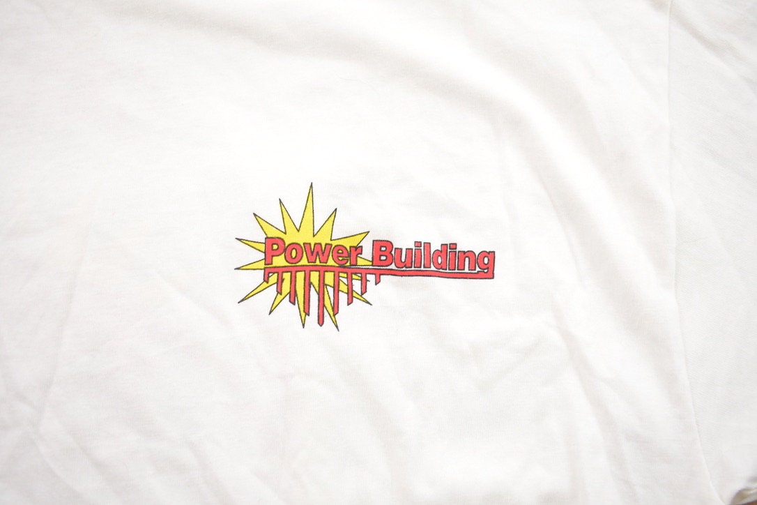 Vintage 1990s Hanes Power Building Cornerstone Construction Alaska Buff Worker Graphic T-Shirt