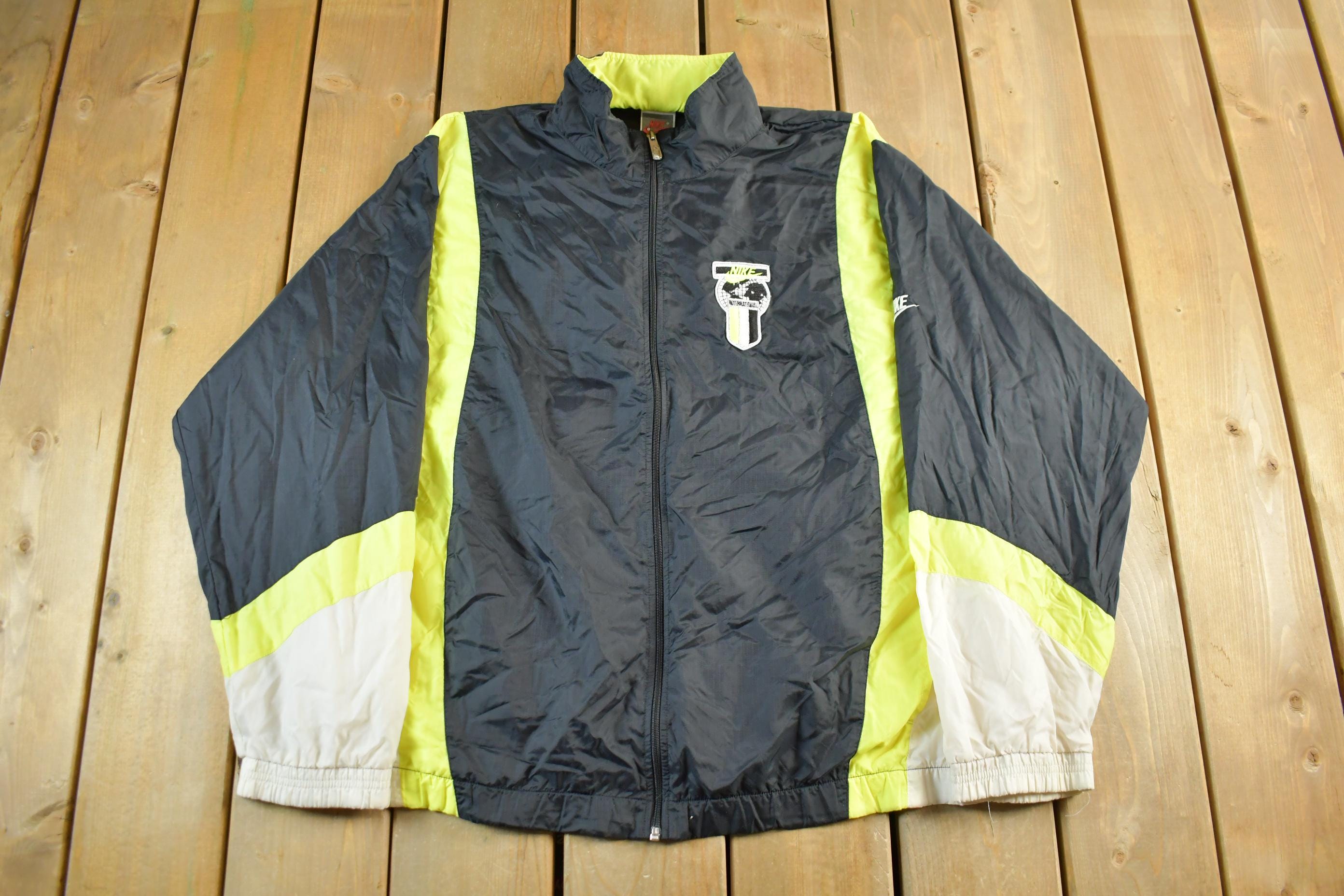 Vintage 1990s Nike International Swoosh Color Block Windbreaker Jacket Men's XL