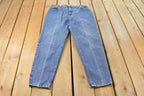 Vintage 1990s Levi's 551 Relaxed Tapered Fit Denim Jeans Women's 33 x 30 / Distressed Jeans / Made in USA