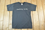Vintage 1990s Smoking Sucks Souvenir Single Stitch Graphic Print T-Shirt Made In USA
