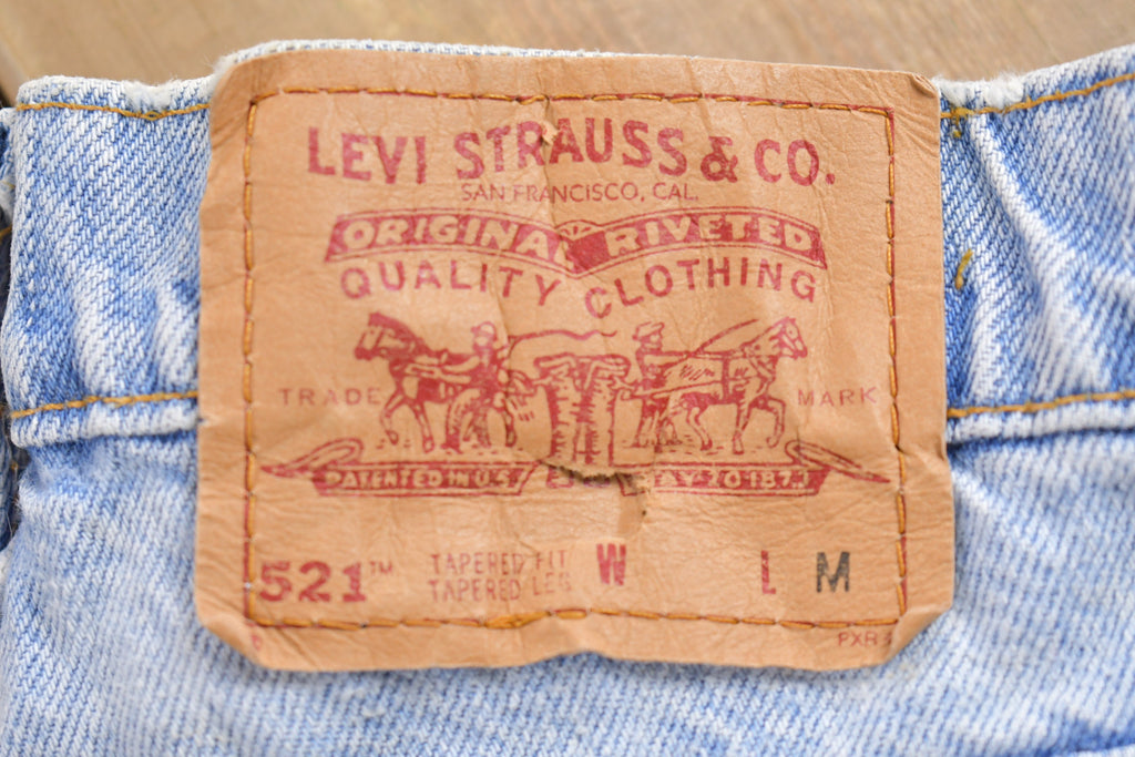 Vintage 1990s Levi's 521 Red Tab Denim Jeans Size 32 x 29.5