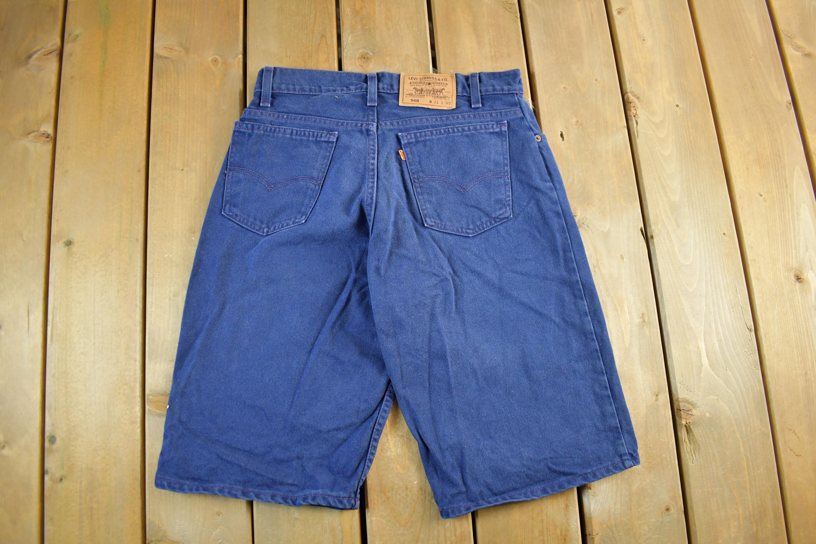 Vintage 1990s Levi's 560 Orange Tab Denim Jean Shorts 31