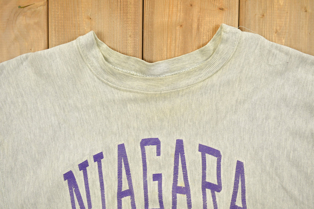 Vintage 1980's Champion Reverse Weave Warm-up Collegiate Crewneck University of Niagara Heavily Distressed.