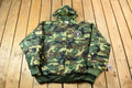 Vintage 1990s Camo Raiders NFL Football Hooded Puffer Jacket