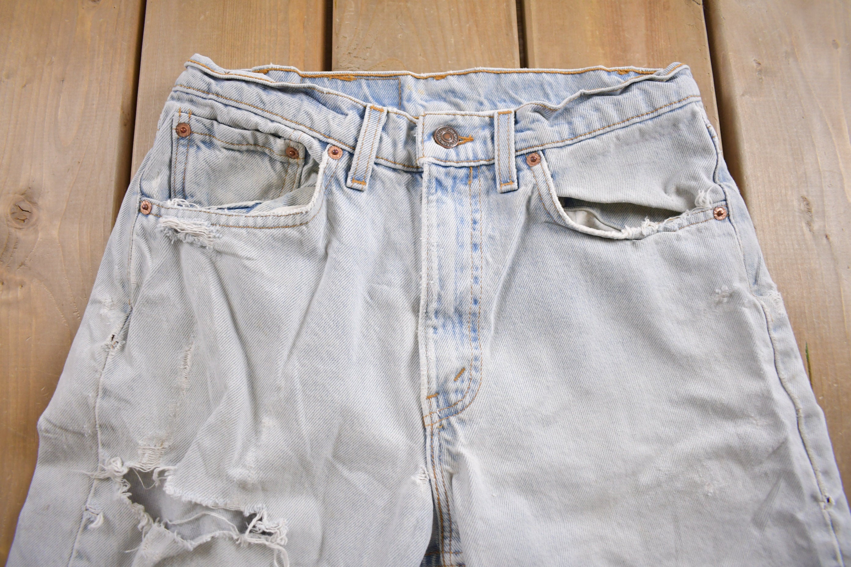 Vintage 1990s Levi's 550 Light Wash Distressed Jeans Size 30 x 30