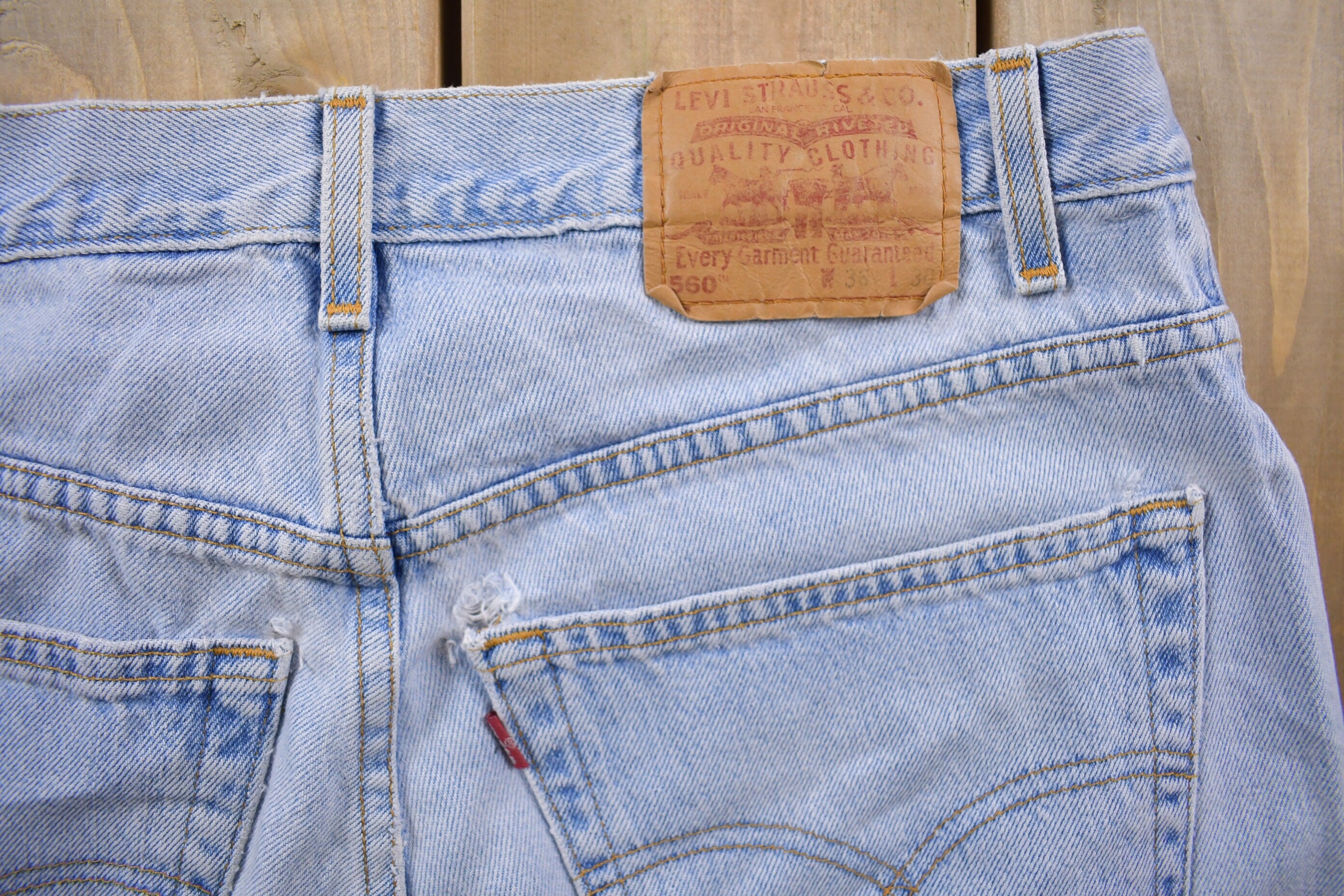 Vintage 1990s Levi's 560 Red Tab Distressed Jeans Size 34 x 30