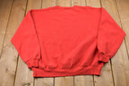 Vintage 1990s Russell Athletics Detroit Red Wings NHL Graphic Sweatshirt