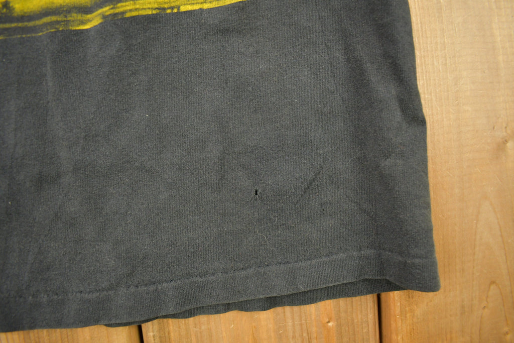Vintage 1990s Minnesota Vikings NFL Graphic Nutmeg T-Shirt