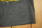 Vintage 1990s Minnesota Vikings NFL Graphic Nutmeg T-Shirt