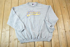 Vintage 1990s Minnesota Vikings Embroidered NFL Crewneck PUMA Sweatshirt