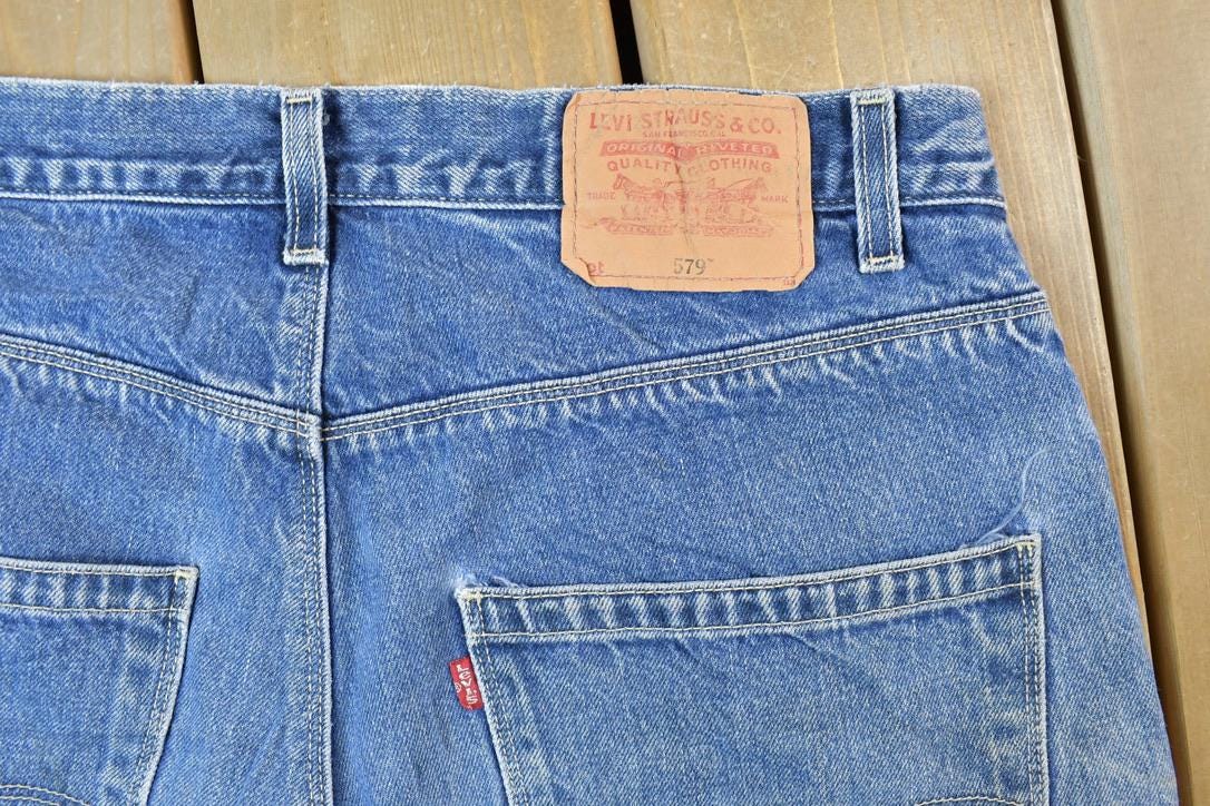 Vintage 1990s Levi Strauss 579 Red Tab Baggy Fit Denim Jeans Size 33 x 30