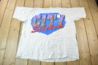 Vintage 1993 Tiny Tunes City Slickers All Over Print Graphic T-Shirt